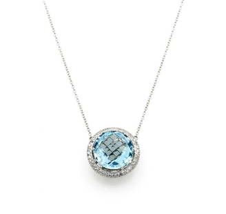 18K WG Blue Topaz and Diamond Halo Pendant Necklace: Beautiful pendant necklace in 18k white gold featuring a vibrant blue topaz gemstone haloed by approx 0.75ctw of diamonds with H-I color and SI clarity. The chain is approx 16.5" long and the