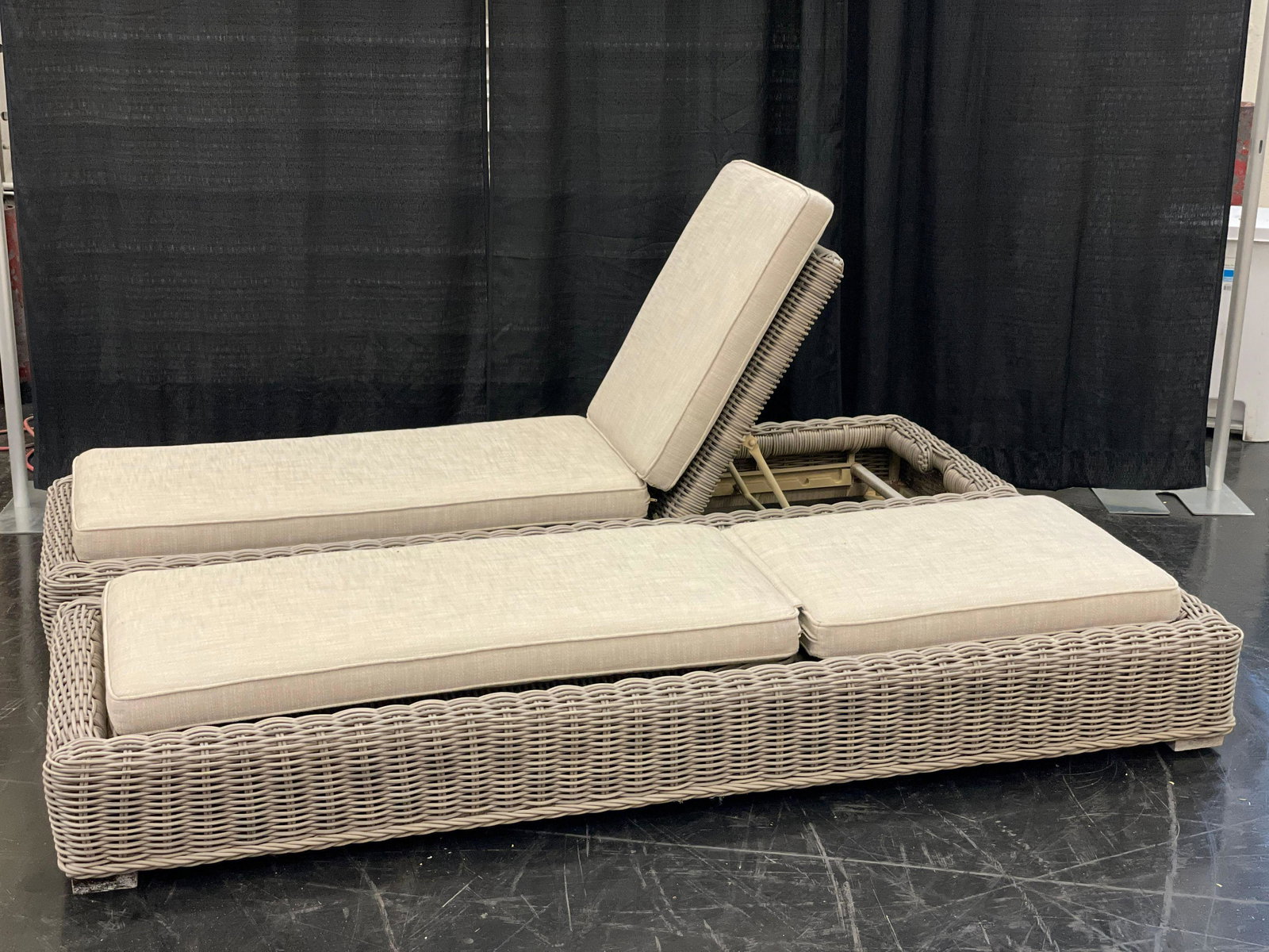 Lot of 4 Gray Wicker Lounge Recliners: 4 wicker lounge recliners in gray with cushions. Wicker shows some discoloration on certain parts and the cushions may show a small mark here and there. They measure approx 80” L x 28” w.