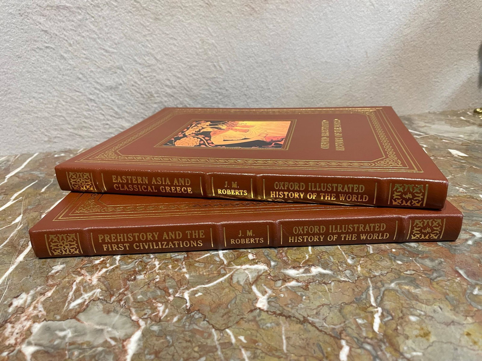Oxford Illustrated History of the World by J.M. Robert: The Oxford Illustrated History of the World by J.M. Roberts has 2 volumes. They were printed in199 by The Oxford University Press and are in excellent condition. They measure 12" tall Box 106 Have