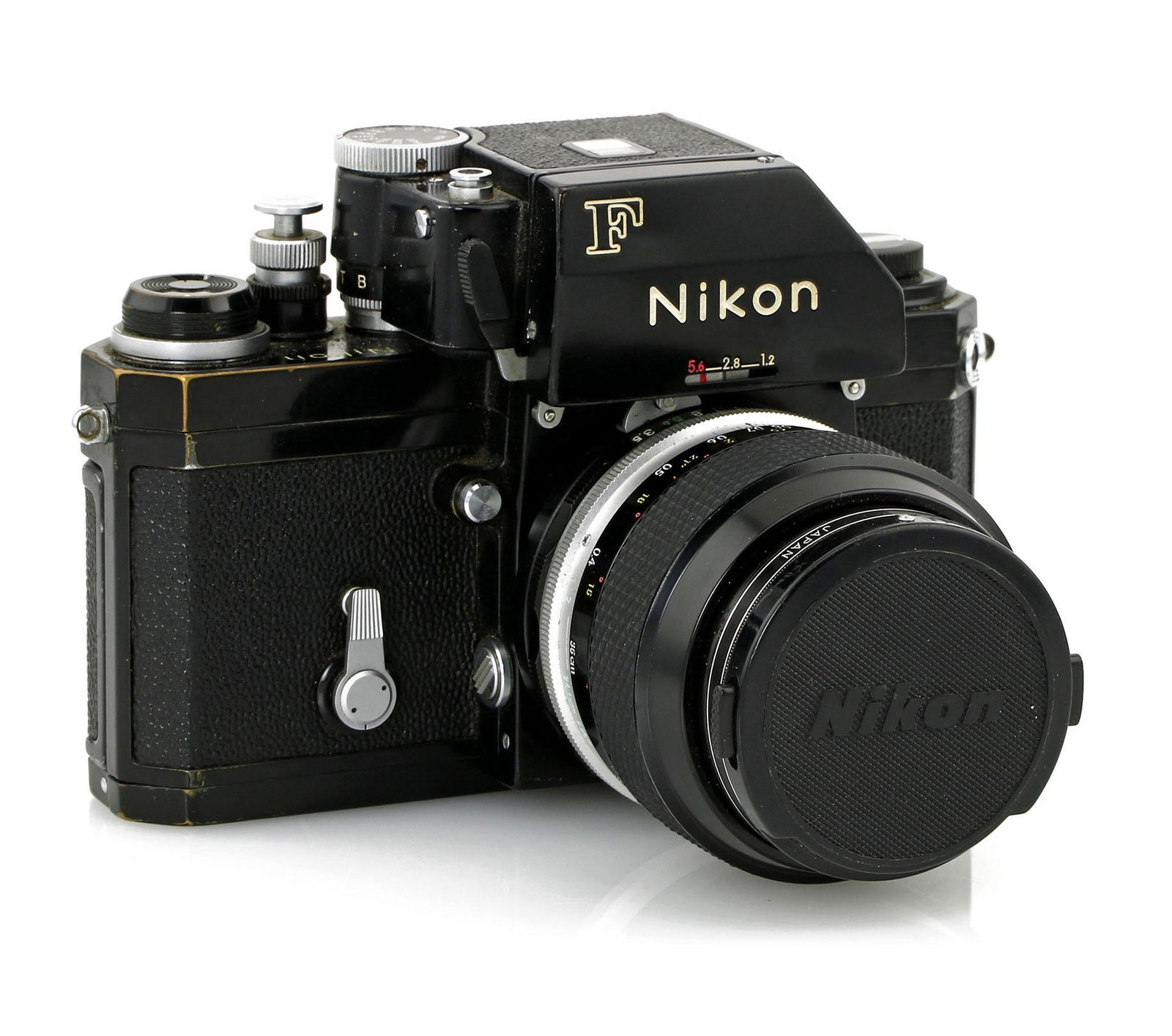 Nikon F Photomic Camera Body with Lens: Nikon F Photomic body with 55mm lens. Camera and lens are in overall good condition for their age. Just show some light wear/scratching here and there on the finish. Camera and lens have not been test