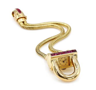 Van Cleef & Arpels "Cadenas" 18K Ruby Watch: Unique Art Deco Cadenas VCA Van Cleef Arpels quartz watch in 18k yellow gold with rubies. It has a 26mm x 15mm case, approx 5.75" snake chain bracelet, and weighs 65 grams. wpm1012101 Have a simi