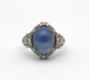 Art Deco Platinum Star Sapphire & Diamond Ring: Art Deco Platinum 10.79ct. Blue Star Sapphire & 0.86ct. Diamond Ladies Ring. Size approx. - 4 - 4 1/2. Star sapphire - 12mm x 9mm x 9.25mm, weighing approx. 10.79ct. Sapphire is of slightly violet