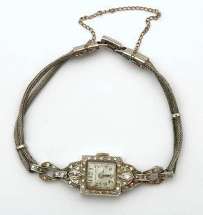 Art Deco Hamilton Platinum & Diamond Ladies Watch: Art Deco Hamilton Platinum & 0.54ct. Diamond Ladies Watch. In working condition, #F118876. 17 jewel manual movement. The case is stamped Platinum by Dinhoffer. Enhanced with marquise cut diamond b