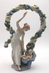 Lladro "Rebirth" #6751 Porcelain Group: Lladro "Rebirth" #6751 Porcelain Group. With original box. Measures approx. - 16 1/2" high x 11" wide. Overall in great condition, some flowers have damage. Have a similar item to sell