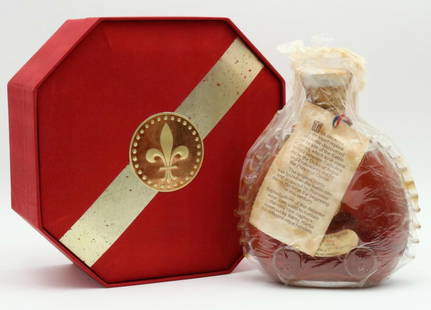 Remy Martin Louis XIII Baccarat Cognac Decanter: Unopened, Baccarat (France, French) Louis XIII, E. Remy Martin & Co. Cognac "Grande Champagne" Crystal Decanter. With original presentation box and wrapping around bottle. Includes origina