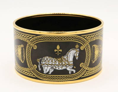 Hermes "Grand Apparat" Wide Enamel Bangle: Hermes "Grand Apparat" Wide Enamel Bangle. Gold plated bangle. Measures approx. - 1 3/8" thick. Measures approx. - 2 1/4" inside across. Have a similar item to sell? Contact us at inf