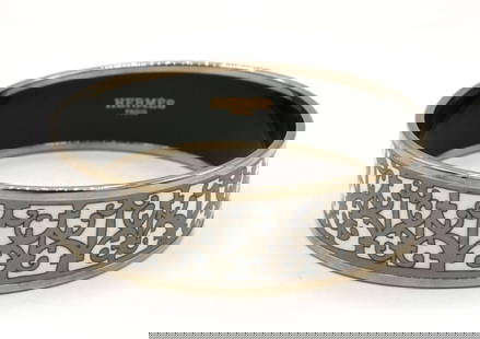 Hermes "Balcons du Guadalquivir" Enamel Bracelet: Hermes "Balcons du Guadalquivir" Enamel Bracelet. Measures approx. - 3/4" thick. Measures approx. - 2 1/4" inside across. Have a similar item to sell? Contact us at info@marketauc