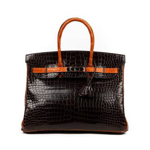 Hermes Birkin 35 Porosus Crocodile Purse: Hermes Birkin 35 Porosus Crocodile Purse/Hang Bag. Circa 2007. With palladium hardware (comes with dust cover) - This exceptional handbag from Hermes is a must have for Hermes collectors and fashion l