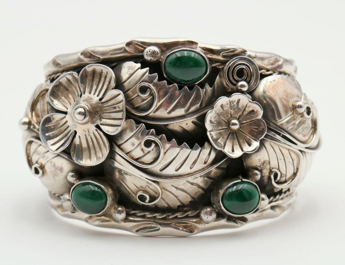 Taxco 950 Sterling & Malachite Cuff: Taxco 950 Sterling Silver & Malachite Cuff. Measures approx. - 2 1/2" inside across. Weight - 100.2 grams. Have a similar item to sell? Contact us at info@marketauctionsinc.com **If you d