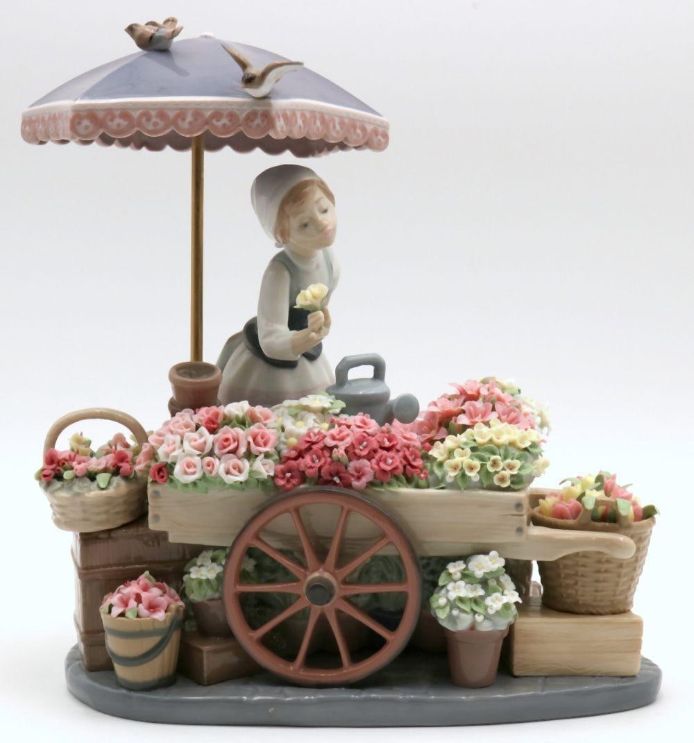 Lladro "Flowers of the Season" #1454 Porcelain Sculpture: Lladro "Flowers of the Season" #1454 Porcelain Sculpture. Designer - Jose Puche. Year designed - 1983. Total measurements with base - 12" high x 10 1/2" long x 7 1/2" deep. Have a 