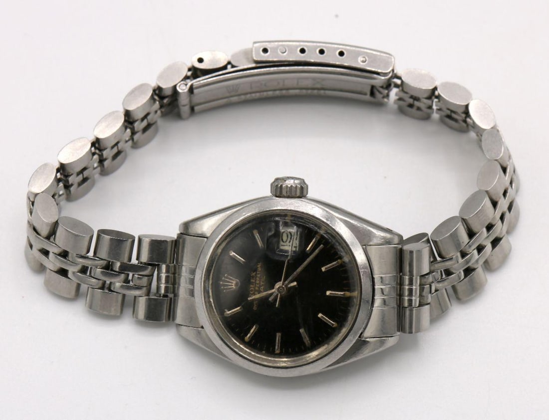 Vintage Rolex Ladies Stainless Steel Watch: Vintage Rolex Ladies Stainless Steel Watch. This watch is being sold as is, the band is worn and possibly aftermarket. Oyster perpetual, date. WPM1032805 Have a similar item to sell? Contact us at in