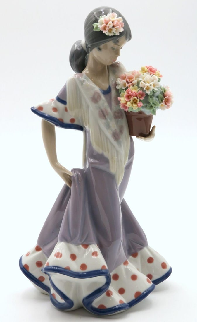 Lladro "Flor Maria" #5490 Porcelain Sculpture: Lladro "Flor Maria" #5490 Porcelain Sculpture. With original box (please note - box is sold as is). Measures approx. - 10" high x 5 1/2" wide. Have a similar item to sell? Contact us a