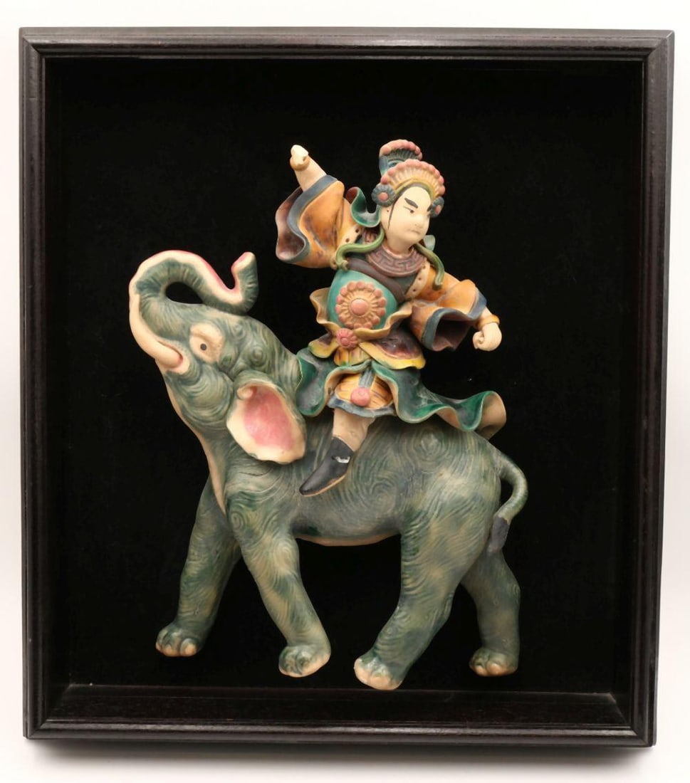 Antique Chinese Warrior Pottery Roof Tile: Antique Chinese Warrior Pottery Roof Tile. Depicting warrior on elephant. Pottery measures approx. - 15" high x 12" wide, total with frame - 20 1/2" high x 18 1/4" wide. Please note -