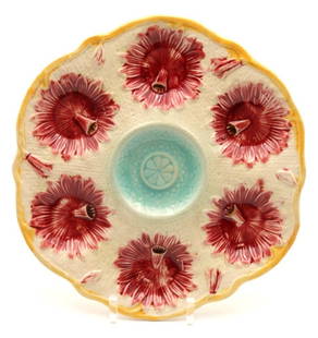 Samuel Lear Majolica 6 Well Oyster Plate: Samuel Lear Majolica 6 Well Oyster Plate. Measures approx. - 9 3/4" diameter. Marked Lear on back. Have a similar item to sell? Contact us at info@marketauctionsinc.com Please review all photo