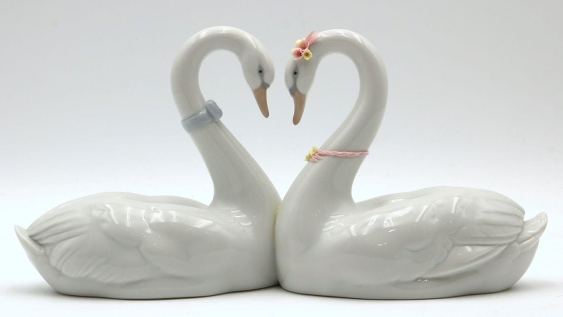 Lladro "Endless Love" #6585 Porcelain Group: Lladro "Endless Love" #6585 Porcelain Group. With original box, depicting swans. Measures approx. - 5 1/2" high x 10 1/2" long. Have a similar item to sell? Contact us at info@mark