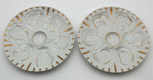 Pair of Porcelain 6 Well Porcelain Oyster Plates: Pair of Porcelain 6 Well Porcelain Oyster Plates. Measures approx. - 9 1/4" diameter. Have a similar item to sell? Contact us at info@marketauctionsinc.com Please review all photos closely. Th