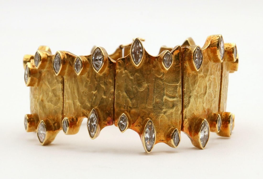 Vintage Ed Wiener 18Kt & Diamond Ladies Bracelet: Vintage Ed Wiener 18Kt Yellow Gold & Diamond Ladies Bracelet. Bracelet has approx. 40 marquise cut diamonds, approx. 5.00cts. Weight approx. - 59.3 dwt. Have a similar item to sell? Contact us at
