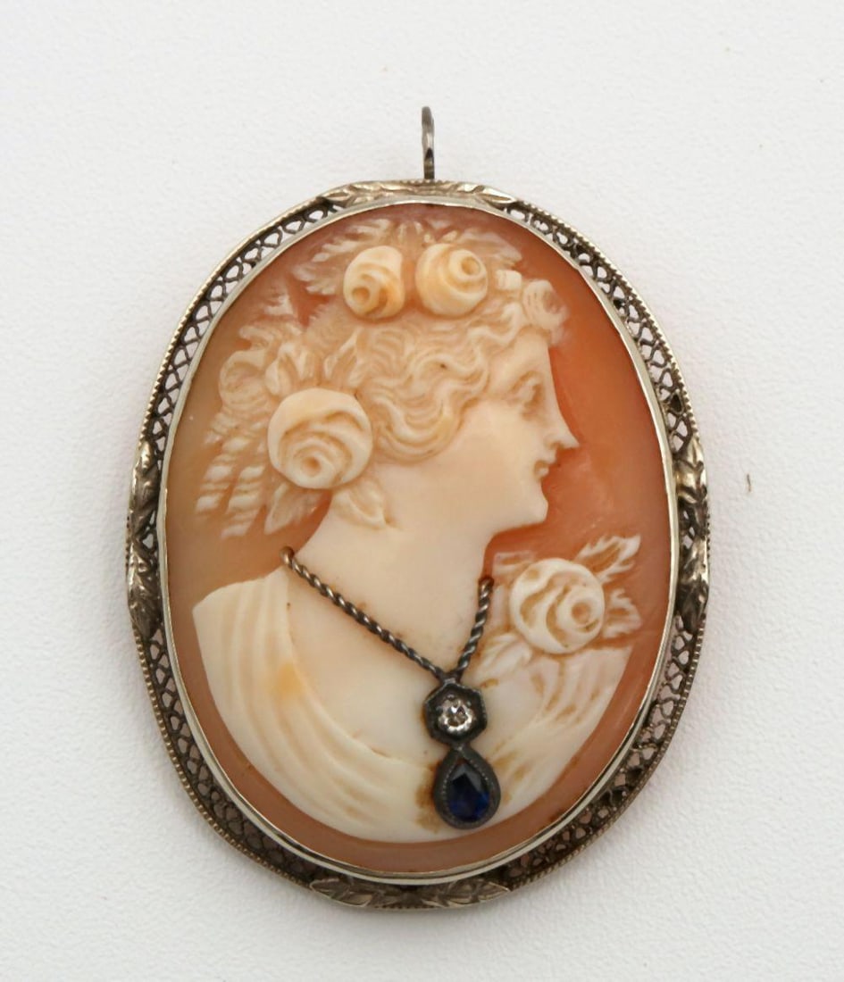 Antique 14Kt Cameo Brooch: Antique 14Kt Cameo Brooch. With diamond, measures approx. - 1 1/2" x 1 1/4". Weight - 7.42 grams. Have a similar item to sell? Contact us at info@marketauctionsinc.com **If you do not want