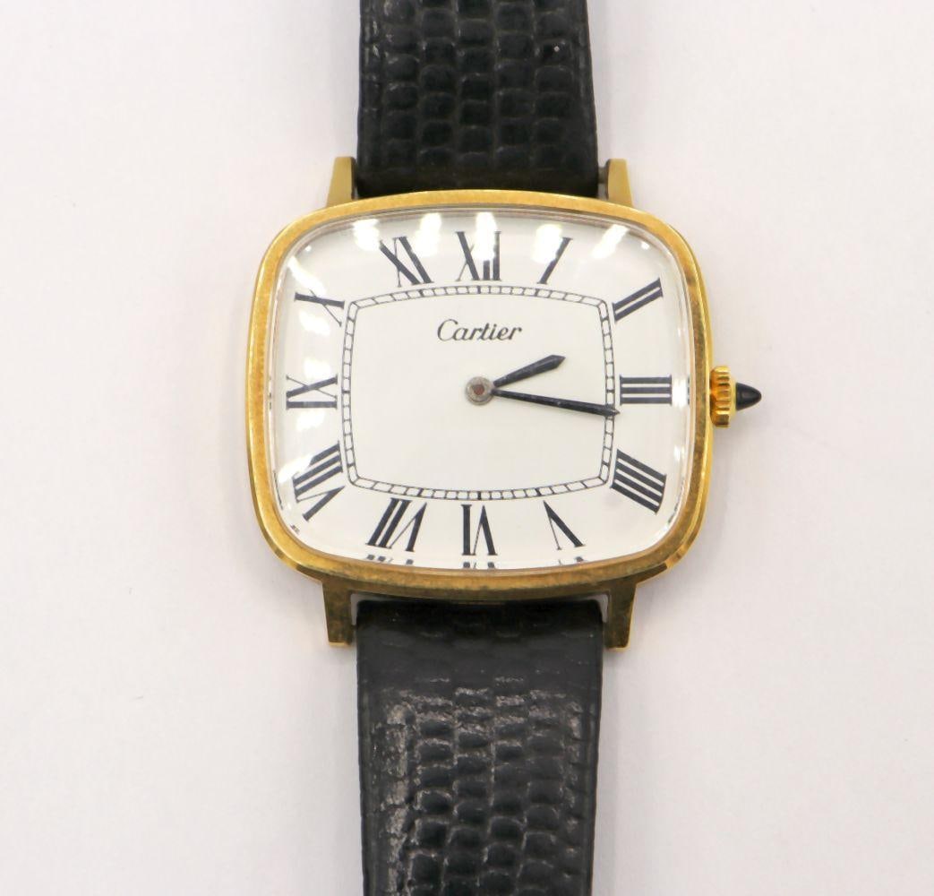 Vintage Cartier Style 18Kt Gold Plated Tank Watch: Vintage Cartier Style 18Kt Gold Plated Tank Watch. This watch is marked Cartier on front of dial and on back, we do not guarantee for this to be an original Cartier, watch is being sold as is. Black l
