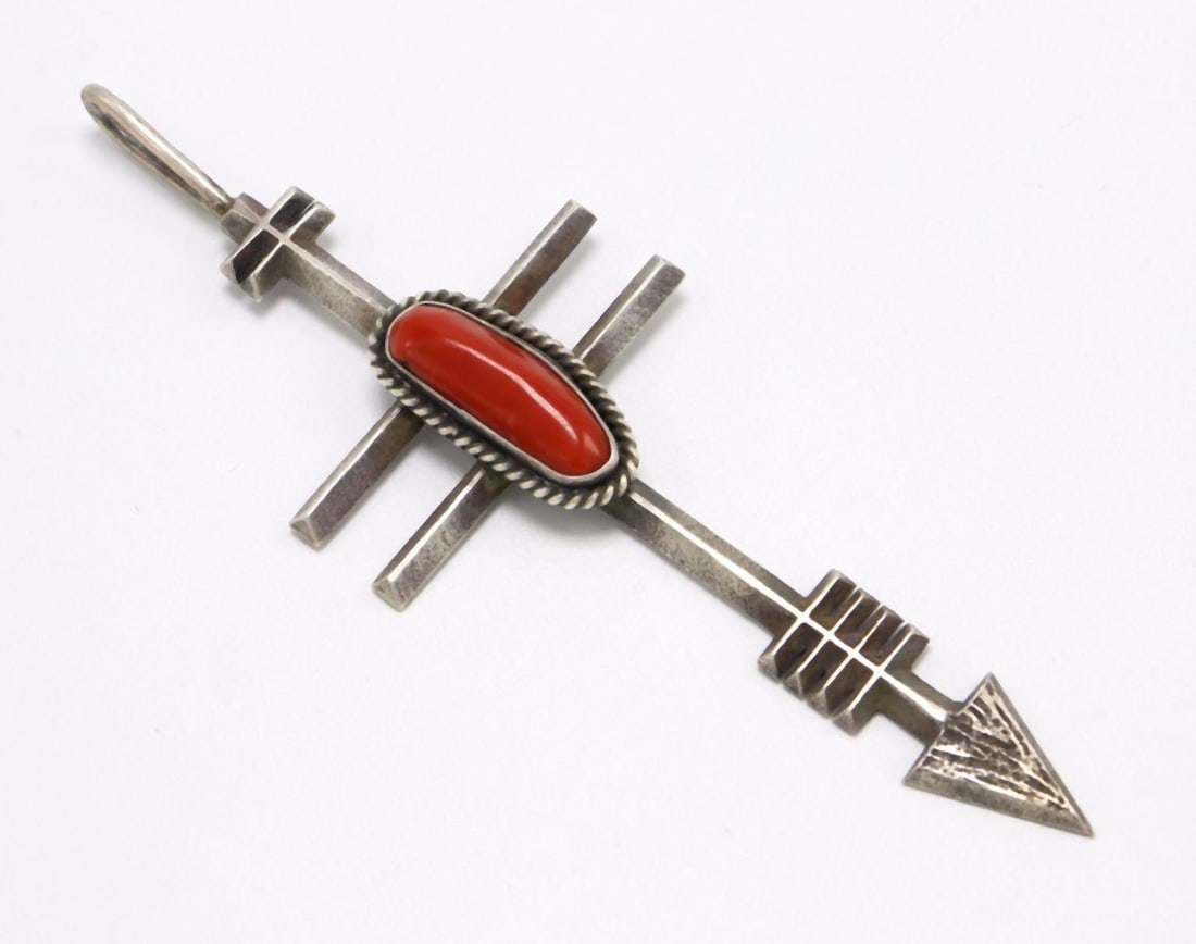 Signed Native American Coral & Sterling Silver Arrow Pendant: Signed Native American Coral & Sterling Silver Arrow Pendant. Signed AA, possibly Aaron Anderson or Art Acoya. Measures approx. - 5 1/4" long. Weight approx. - 28 grams. Have a similar item t