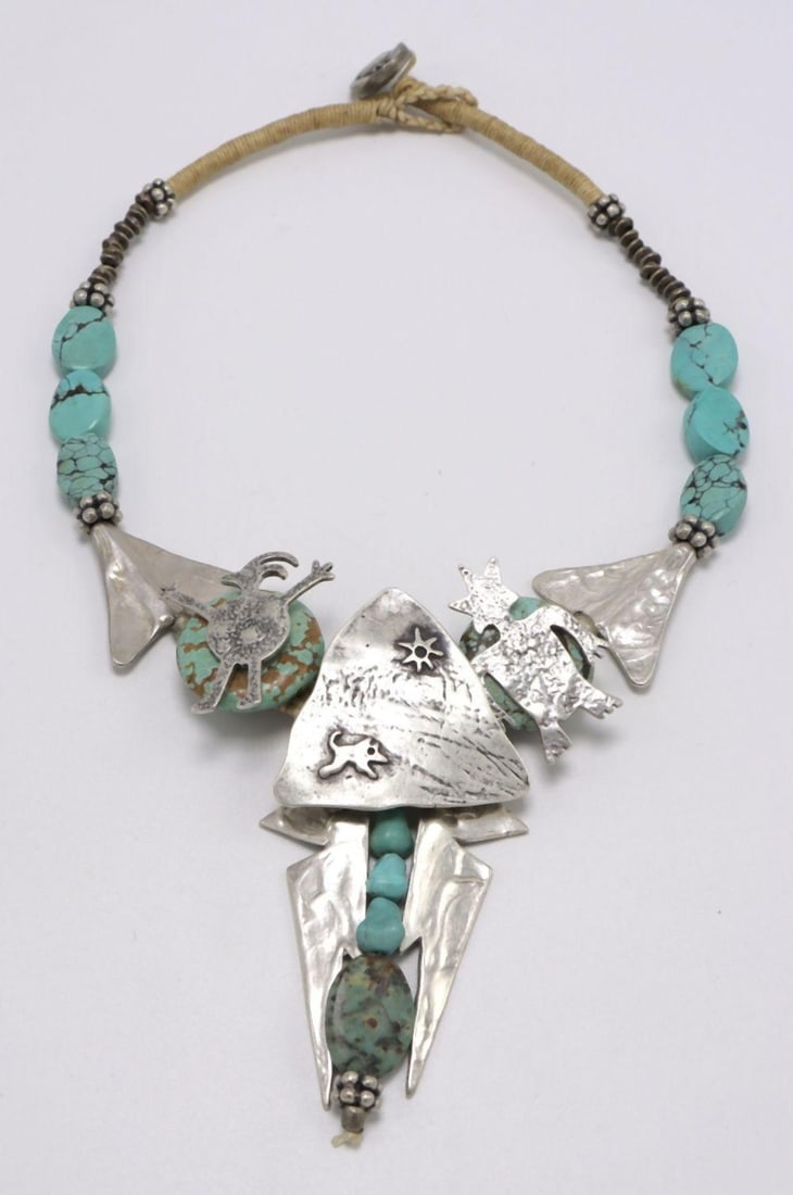 Mary & Doug Hancock Sterling & Turquoise Collar/Necklace: Mary & Doug Hancock Sterling Silver & Turquoise Collar/Necklace. Measures approx. - 14" long. Weight approx. - 71.5 grams. Textured triangle featuring the sun symbol and coyote. Silver pet