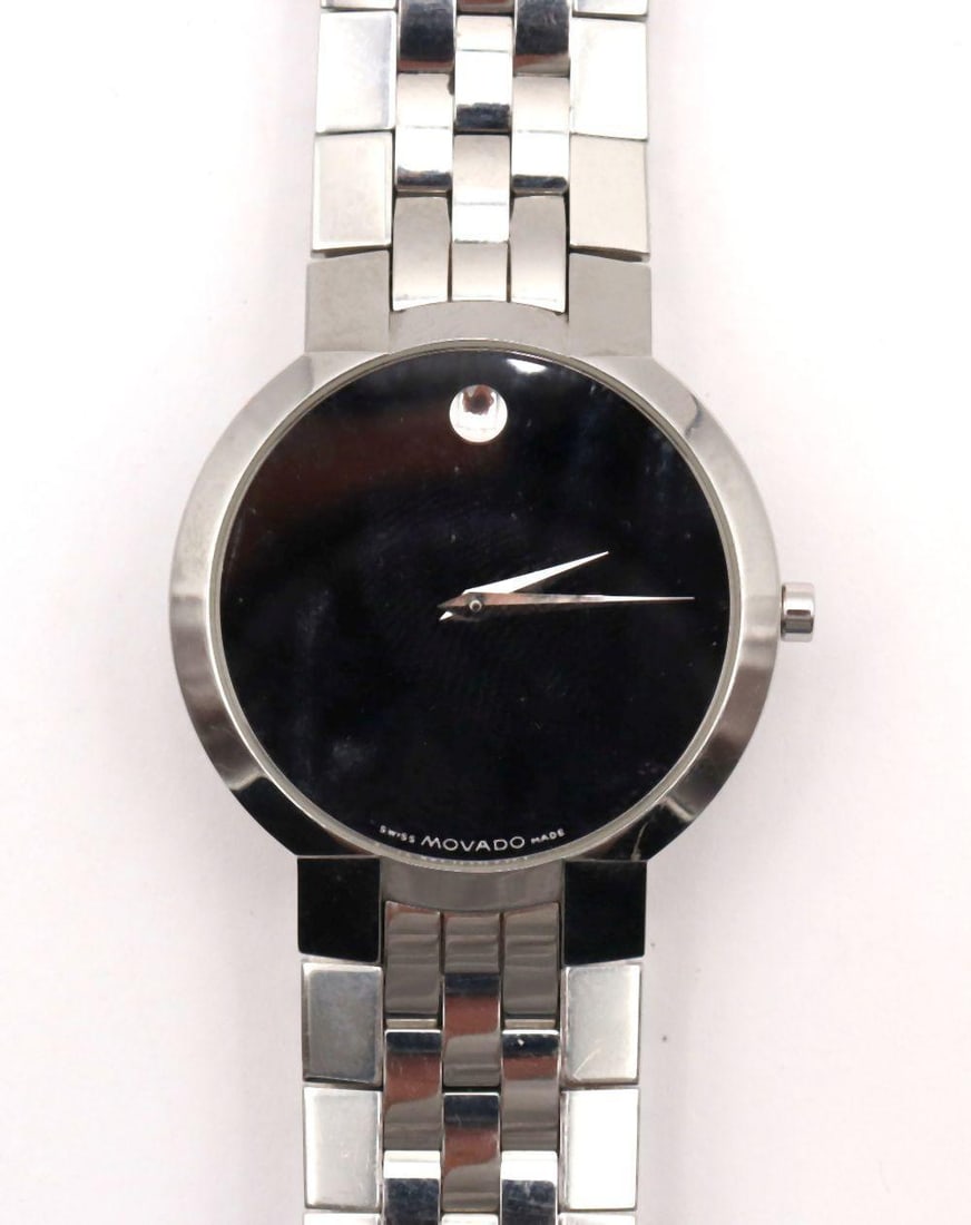 Movado "Museum" Stainless Steel Wristwatch: Movado "Museum" Stainless Steel Wristwatch. 8445 1891 model, black dial. With original band. Have a similar item to sell? Contact us at info@marketauctionsinc.com **If you do not want us