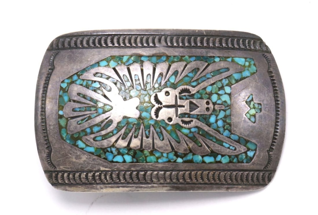 Gibson Gene Navajo Inlaid Turquoise & Sterling Belt Buckle: Gibson Gene Navajo Inlaid Turquoise & Sterling Silver Belt Buckle. Measures approx. - 3" long x 2" wide. Weight approx. - 35.1 grams. Have a similar item to sell? Contact us at info@m