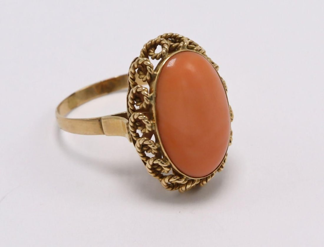 14Kt Yellow Gold & Coral Ring: 14Kt Yellow Gold & Coral Ring. Size approx. - 8 1/4. Weight approx. - 2.3 dwt. Have a similar item to sell? Contact us at info@marketauctionsinc.com **If you do not want us to ship for you, pl