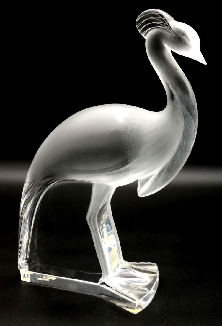 Lalique "Louisiane" Crystal Sculpture: Lalique France (French) "Louisiane" Clear & Frosted Crystal Sculpture. Depicting a peacock/crane. Measures approx. - 14" high x 9" wide. Signed on base. Have a similar item to sell