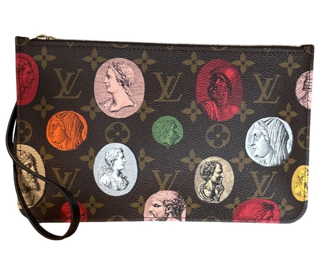 Louis Vuitton "Fornasetti" Limited Edition Pouch: Louis Vuitton (French) "Fornasetti" Limited Edition Pouch. With monogram cameo style. Measures approx. - 10" long x 6" high x 1/2" deep. Have a similar item to sell? Contact us at 