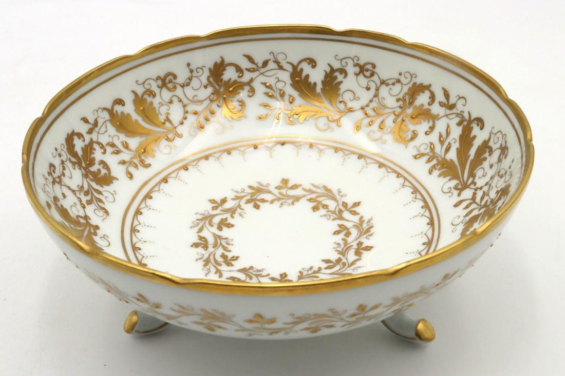 Camille Le Tallec for Tiffany & Co. "Coeur Fleurs" Porcelain Bowl: Le Tallec (France) Hand Painted Porcelain Footed Serving Bowl. Boasting elegant gilt floral motifs and garlands around a centered gold reef. Measures approx.- 7 1/4" in diameter, 3 1/8" in dep