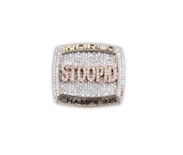6ix9ine's "STOOPID" World Champions Ring: 6ix9ine's "STOOPID" World Champions Ring. 10Kt Tri-Color (Yellow, White and Rose Gold). Weight approx. - 33.3 dwt (51.78 grams). Metal analyzer confirms this to be 10Kt, ring is