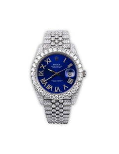 Rolex Datejust Stainless Steel Wristwatch: Rolex Datejust Stainless Steel Wristwatch. 41MM, model 126300. With jubilee bracelet. Watch has an aftermarket bezel. Aftermarket clear stone blue dial. Aftermarket clear stones set in recessed prong
