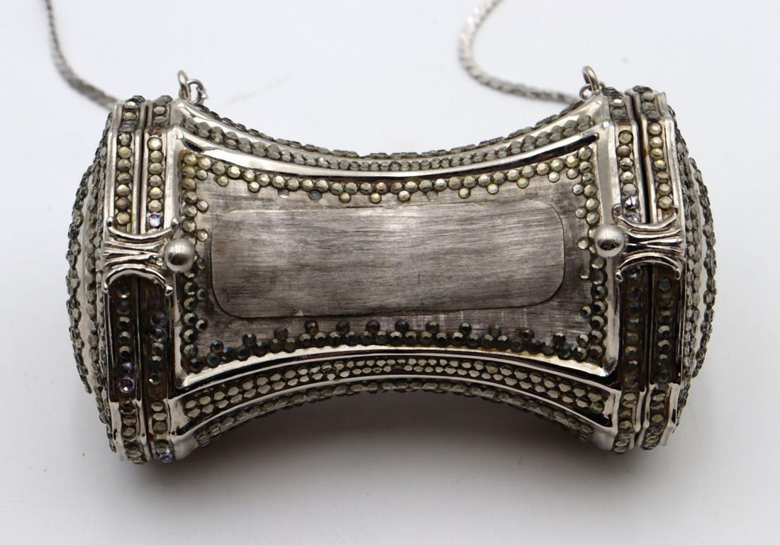 Vintage Judith Leiber "Bowtie" Swarovski Crystal Bag: Vintage Judith Leiber "Bowtie" Swarovski Crystal Bag. Measures approx. - 3 3/8" high x 5 1/2" long. Purse is being sold as is. please see pictures. Have a similar item to sell? Contact