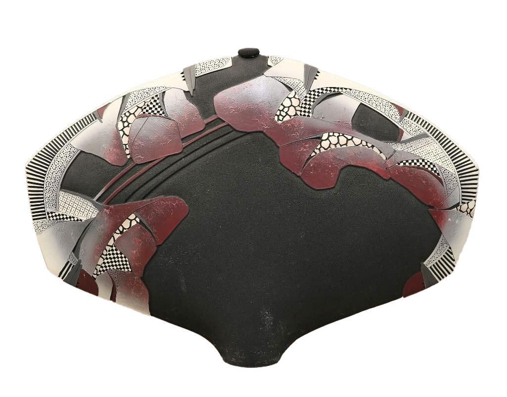 Ceramic Hand Painted Urn: Unique hand painted urn featuring various hand painted colors and patterns. It is dated '91 on the base. Measures approx 18" H x 26.5" W. Has a small repair to the top. Please see photos.