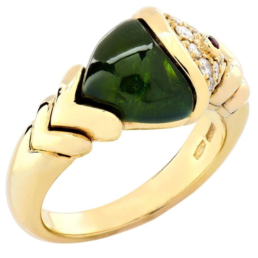 Bvlgari Naturalia Green Tourmaline Fish Ring: From the iconic Italian house of Bvlgari, this captivating ring is artfully crafted in 18k yellow gold, embodying the brand?s bold aesthetic and refined craftsmanship. The design features