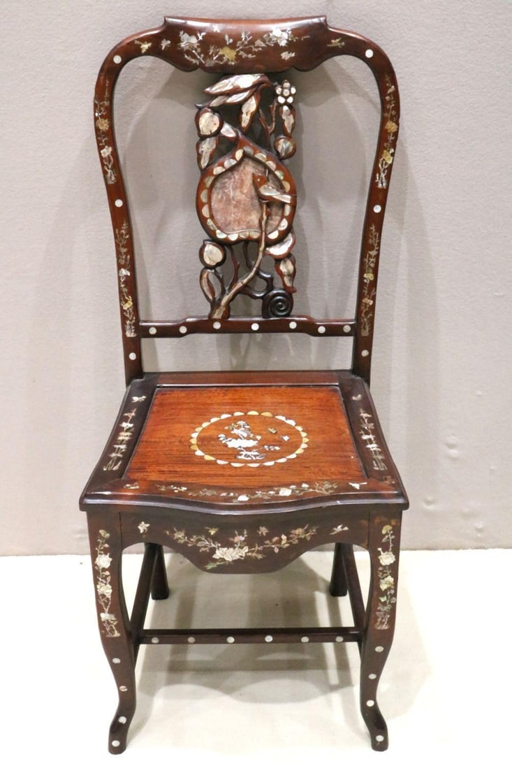 19th Century Vietnamese Rosewood Chair: 19th Century Vietnamese Rosewood Chair with ornate mother-of-pearl inlays and marble stone inlay centered upon the back rest. Measures approx. 38" in height, 16" in width and 15" depth. ?