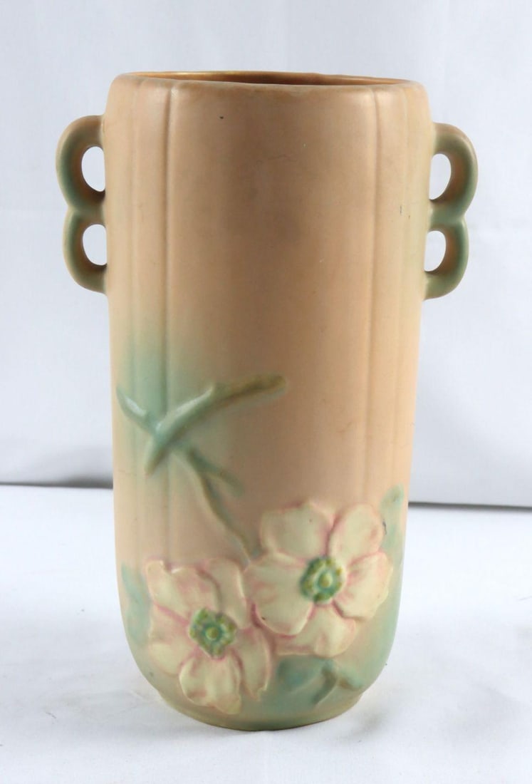 Vintage Weller Pottery Dogwood Vase: Vintage Weller Pottery Dogwood Vase. Measures approx. - 10 1/2"H x 6 1/2" W. No maker mark, heart stamp underside. Condition is overall good. Have a similar item to sell? Contact us at info