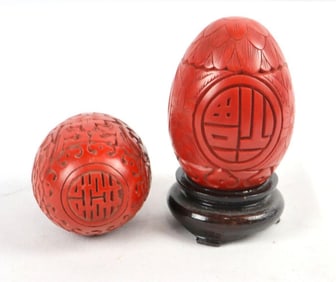Pair of Chinese Cinnebar Carved Eggs