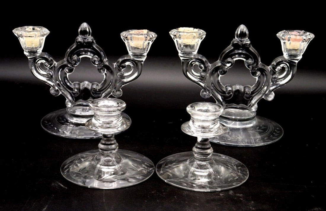 Vintage 4 Pc. Glass Candelabra Set: Vintage 4 Pc. Glass Candelabra Set, Unmarked. Believed to be Cambridge Glass Co. Featuring stunning floral motifs along the base and well tailored details at each square inch. Condition is overall goo