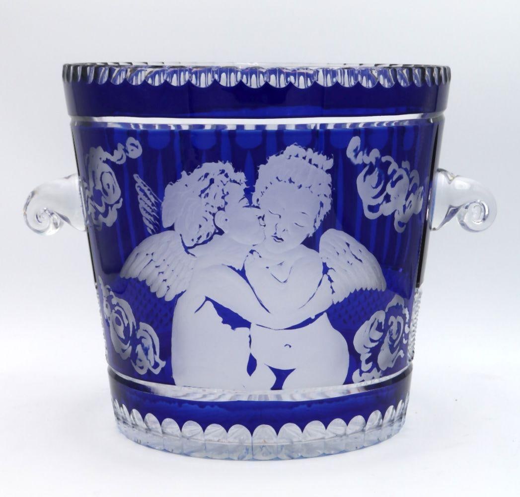 Vintage Czech Cut Cobalt Blue & Crystal Handled Bucket: Vintage Czech Cut Cobalt Blue & Crystal Handled Bucket. Depicting etched cupids. Measures approx. - 10 1/4" high x 14" wide. Have a similar item to sell? Contact us at info@marketaucti