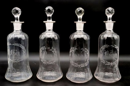Four Antique Etched Glass Liquor Bottles