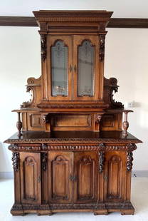 Antique 19th C. French Renaissance Style Wooden Buffet: Antique 19th C. French Renaissance Style Wooden Buffet. Depicting hand carved faces and floral design throughout. Measures approx. - 68&#34; wide x 119&#34; high x 23 1/2&#34; deep. Have a similar ite