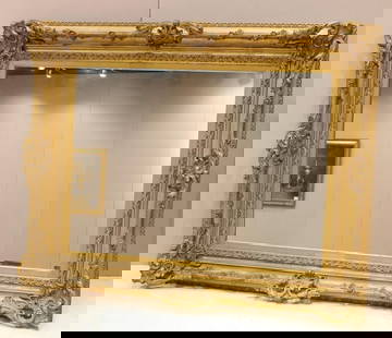 Large 19th Century XV-Style Mirror: Large 19th Century XV-Style Mirror, possibly French or Dutch having giltwood arabesque and vines throughout. Shows some cracking along frame consistent with age. Measures approx: 63 1/8&#34; L x 50 1/