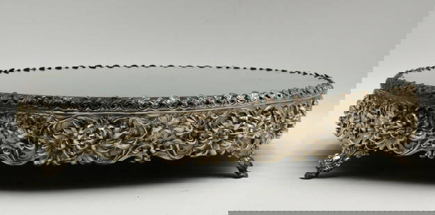 Antique 800 Silver Repousse Mirrored Plateau: Antique 800 Silver Repousse Mirrored Plateau. Repousse silver floral design with mirrored top centerpiece. Measures approx. - 2 1/2&#34; high x 14&#34; wide. Have a similar item to sell? Contact us at