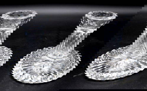 Pair of Waterford Crystal Candlesticks: Pair of Waterford Crystal Candlesticks. Measurement Approx.- 4"D X 3 3/4"H. Please note- Both Candlesticks have chips on them Have a similar item to sell? Contact us at