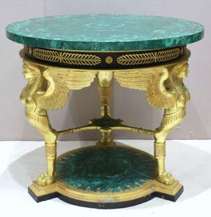 French Empire Style Malachite & Bronze Center Table: Impressive 20th Century French Empire Style Malachite & Dore Bronze Center Table. Neoclassical/Egyptian Revival style, depicting winged griffins with lion feet holding up circular dark green