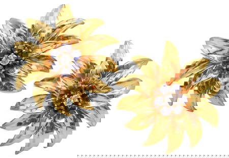 Vintage Tiffany & Co.18Kt Sapphire & Diamond Floral Earrings: Vintage Tiffany & Co.18Kt Sapphire & Diamond Floral Earrings. A rare pair of clips-on earrings created by the jewelry house of Tiffany & Co. back in 1960. The earrings have been