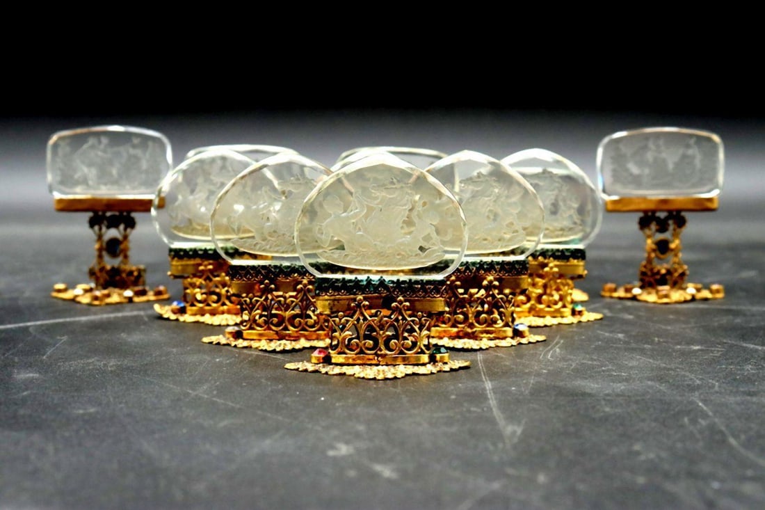 11 Pc. Antique European Intaglio Glass Place Card Holders: 11 Pc. Antique European Intaglio Glass Place Card Holders. Each measure approx. - 2" x 2" with filigree and filigree style footing. Not stamped. Condition is overall good. Have a similar item