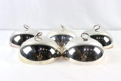 Five Christofle "Vertigo" Silver Plated Cloches